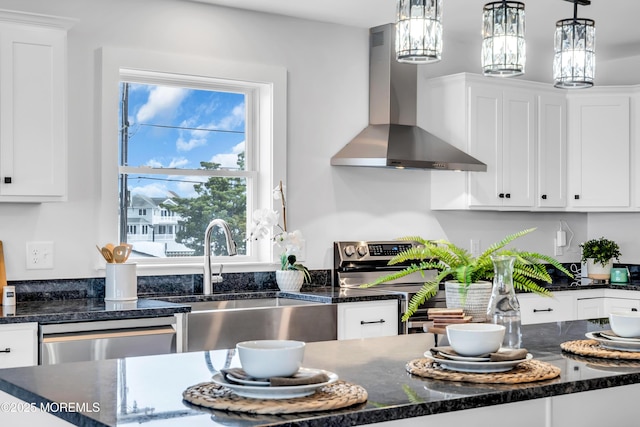 231 Cedar Island Dr, Brick, NJ 08723 - kitchen with wall chimney range hood, appliances with stainless steel finishes, a sink, and white cabinets