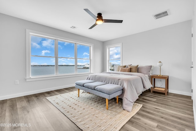 231 Cedar Island Dr, Brick, NJ 08723 - bedroom with baseboards, wood finished floors, and ceiling fan