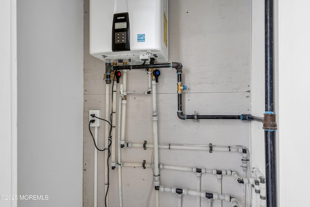 231 Cedar Island Dr, Brick, NJ 08723 - utility room featuring tankless water heater