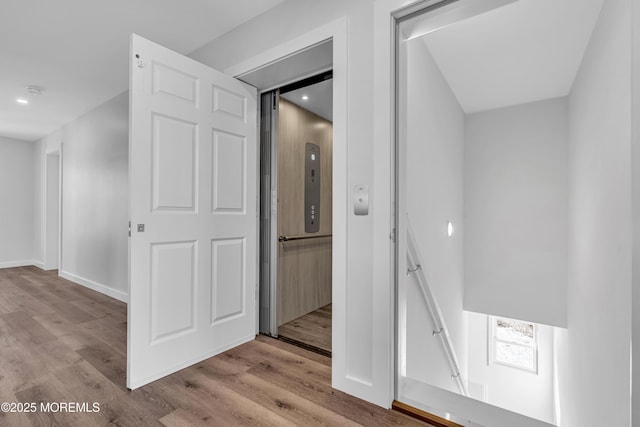 231 Cedar Island Dr, Brick, NJ 08723 - hall with wood finished floors, recessed lighting, baseboards, and elevator