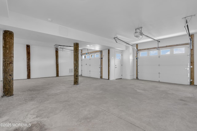 231 Cedar Island Dr, Brick, NJ 08723 - garage featuring a garage door opener
