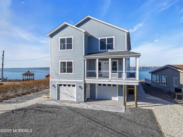 231 Cedar Island Dr, Brick, NJ 08723 - beach home with a water view, a garage, and driveway