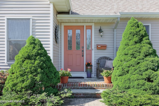 146 Morningside Ave, Union Beach, NJ 07735 - entrance to property with a shingled roof
