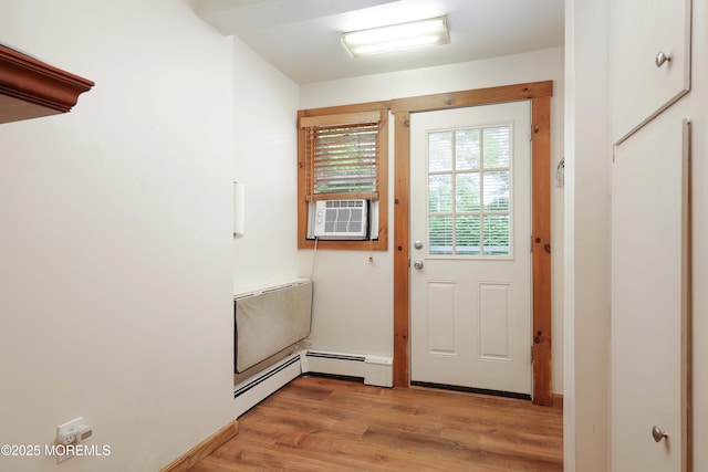 146 Morningside Ave, Union Beach, NJ 07735 - entryway featuring cooling unit, light wood-type flooring, and baseboard heating