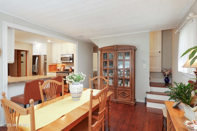 146 Morningside Ave, Union Beach, NJ 07735 - dining area with dark wood-type flooring, baseboards, ornamental molding, and stairway