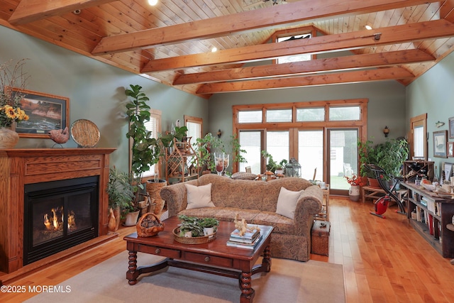 146 Morningside Ave, Union Beach, NJ 07735 - living area with a glass covered fireplace, light wood-style floors, and wood ceiling