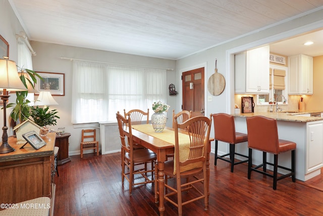 146 Morningside Ave, Union Beach, NJ 07735 - dining area with dark wood finished floors, crown molding, wood ceiling, and baseboards