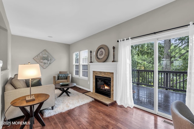 52 Pate Dr, Middletown, NJ 07748 - living room featuring dark wood finished floors and a tile fireplace