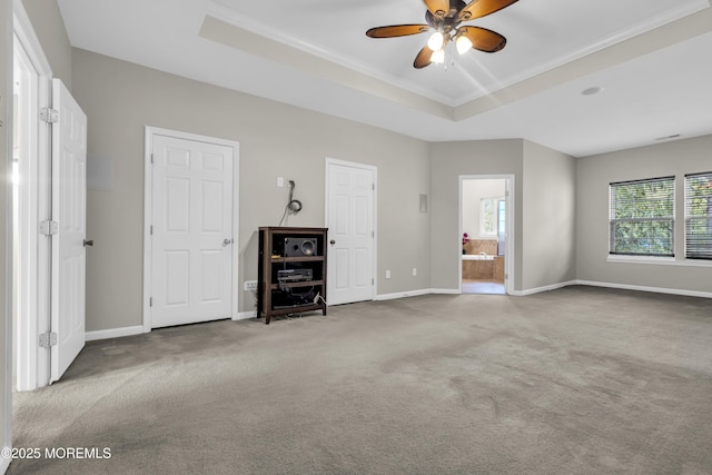 52 Pate Dr, Middletown, NJ 07748 - unfurnished bedroom with a raised ceiling, carpet floors, baseboards, and connected bathroom