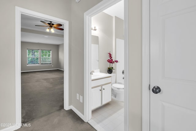 52 Pate Dr, Middletown, NJ 07748 - bathroom featuring vanity, ceiling fan, baseboards, and toilet