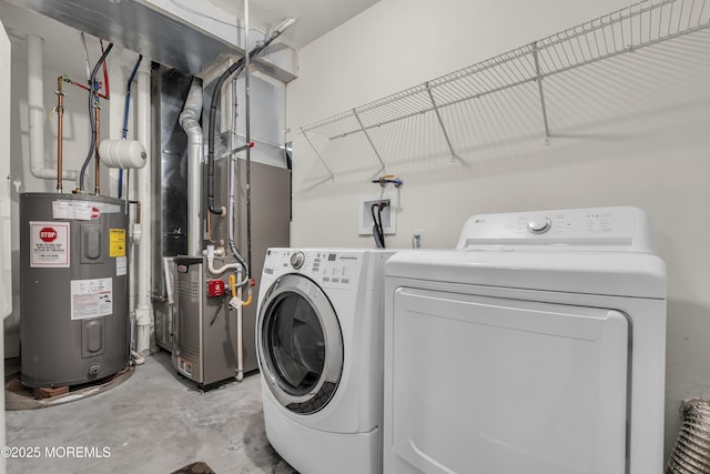 52 Pate Dr, Middletown, NJ 07748 - laundry area with electric water heater and washer and dryer