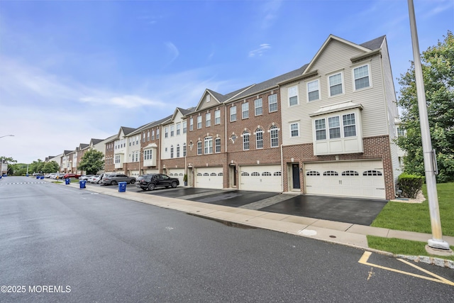 52 Pate Dr, Middletown, NJ 07748 - view of front of house featuring brick siding and a residential view
