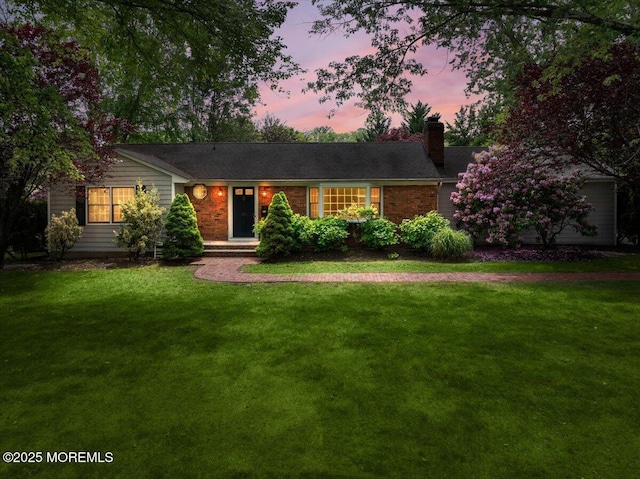 635 Susan Ln, Brielle, NJ 08730 - ranch-style house with a chimney and a lawn