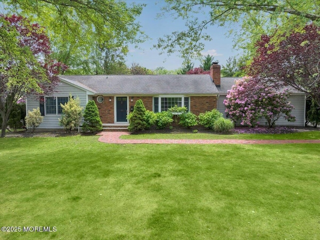 635 Susan Ln, Brielle, NJ 08730 - single story home with a chimney and a front yard