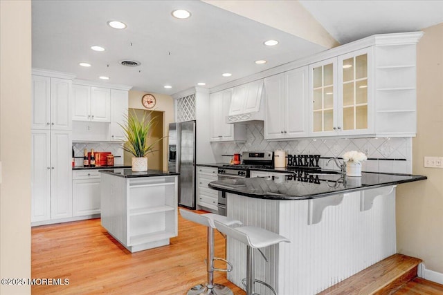 635 Susan Ln, Brielle, NJ 08730 - kitchen featuring open shelves, stainless steel appliances, custom exhaust hood, a peninsula, and white cabinets