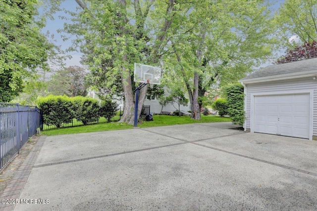 635 Susan Ln, Brielle, NJ 08730 - view of patio featuring concrete driveway and a garage