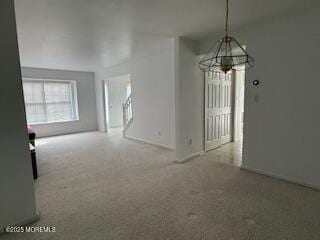 284 Brookfield Dr, Jackson, NJ 08527 - unfurnished dining area with a chandelier and carpet