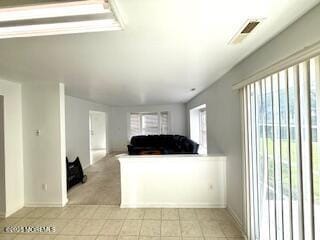 284 Brookfield Dr, Jackson, NJ 08527 - unfurnished living room with light tile patterned floors and baseboards