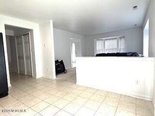 284 Brookfield Dr, Jackson, NJ 08527 - unfurnished living room featuring baseboards