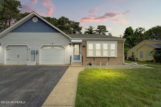 2B Greenwood Ln Unit 62, Whiting, NJ 08759 - view of front of home with driveway, a garage, a yard, and brick siding