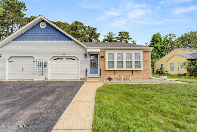 2B Greenwood Ln Unit 62, Whiting, NJ 08759 - view of front facade with driveway, a garage, brick siding, and a front lawn