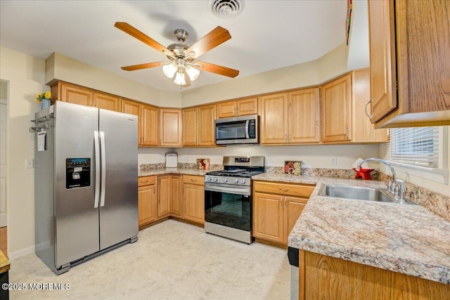 2B Greenwood Ln Unit 62, Whiting, NJ 08759 - kitchen featuring stainless steel appliances, a sink, light countertops, and a ceiling fan
