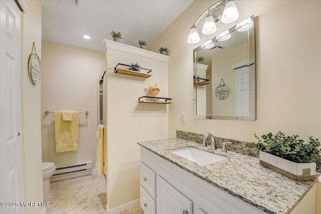 2B Greenwood Ln Unit 62, Whiting, NJ 08759 - full bath with a baseboard heating unit, toilet, vanity, recessed lighting, and baseboards