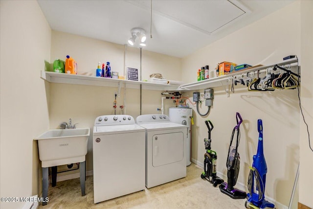 2B Greenwood Ln Unit 62, Whiting, NJ 08759 - washroom with washer and clothes dryer, water heater, and baseboards