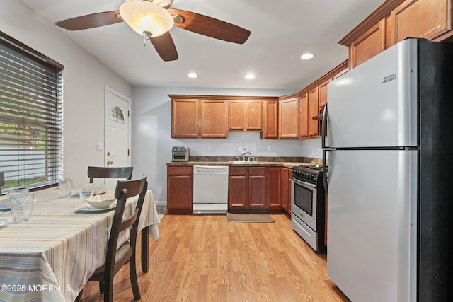 11 Bryant Dr, Jackson, NJ 08527 - kitchen featuring stainless steel appliances, brown cabinetry, light wood-type flooring, recessed lighting, and a ceiling fan