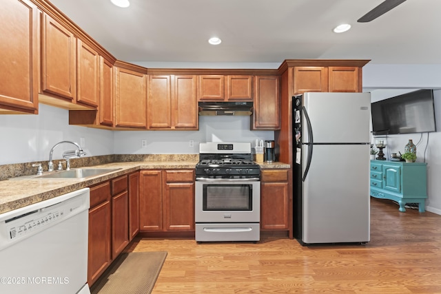 11 Bryant Dr, Jackson, NJ 08527 - kitchen featuring stainless steel appliances, under cabinet range hood, recessed lighting, light wood-style flooring, and brown cabinets
