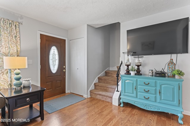 11 Bryant Dr, Jackson, NJ 08527 - entryway with wood finished floors, a textured ceiling, and stairway