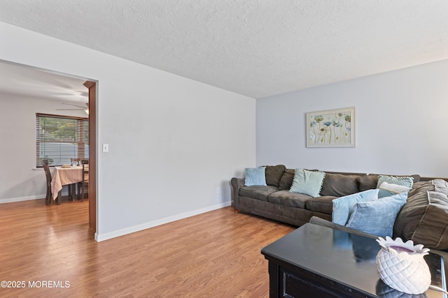 11 Bryant Dr, Jackson, NJ 08527 - living area featuring light wood-style floors and a textured ceiling