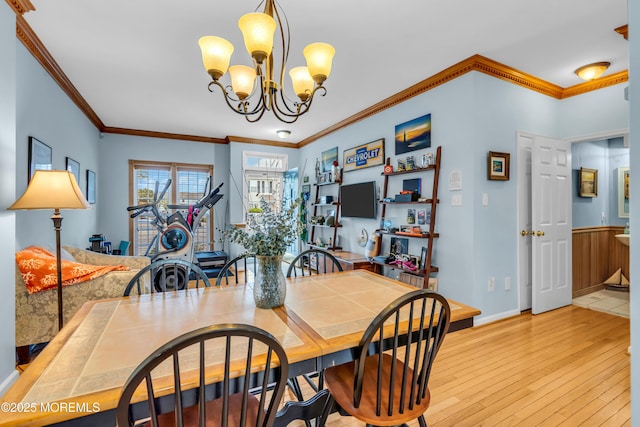 18 Skimmer Ln Unit 53, Bayville, NJ 08721 - dining space with a chandelier, hardwood / wood-style floors, ornamental molding, and baseboards