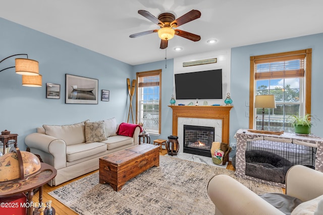 18 Skimmer Ln Unit 53, Bayville, NJ 08721 - living room featuring a ceiling fan, a high end fireplace, recessed lighting, and wood finished floors