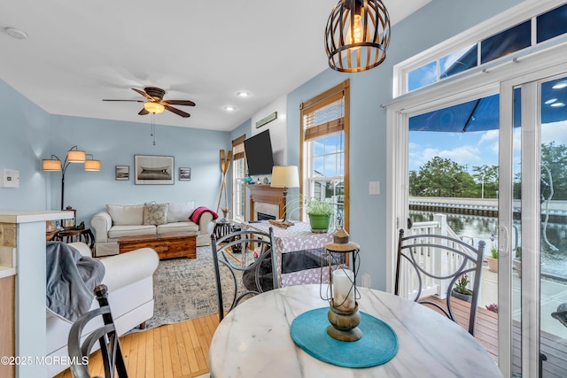 18 Skimmer Ln Unit 53, Bayville, NJ 08721 - living room featuring a ceiling fan, plenty of natural light, wood-type flooring, a fireplace, and recessed lighting