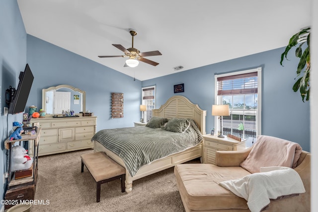 18 Skimmer Ln Unit 53, Bayville, NJ 08721 - bedroom featuring vaulted ceiling, multiple windows, carpet, and a ceiling fan