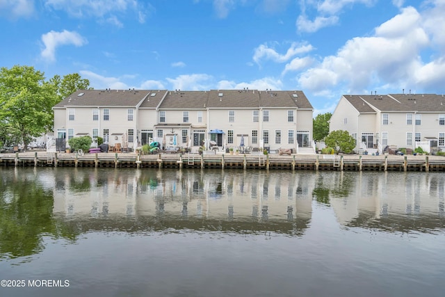 18 Skimmer Ln Unit 53, Bayville, NJ 08721 - rear view of house with a residential view and a water view