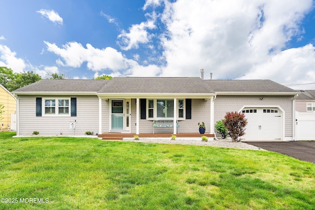 3206 Chicopee Pl, Point Pleasant, NJ 08742 - ranch-style house featuring an attached garage, covered porch, driveway, a front lawn, and roof with shingles