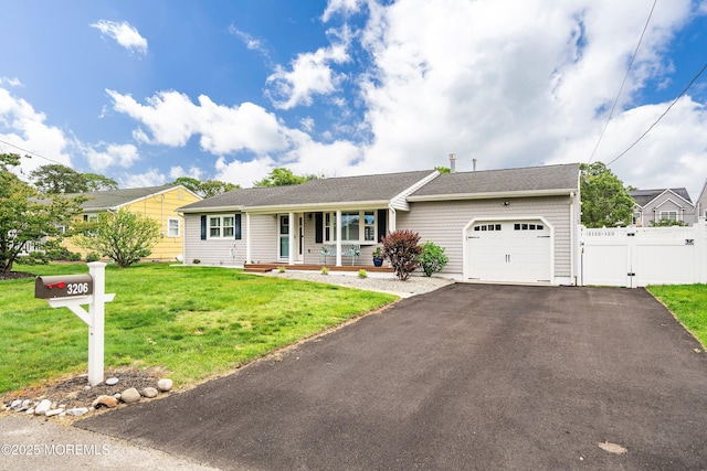 3206 Chicopee Pl, Point Pleasant, NJ 08742 - ranch-style home with a garage, a gate, a porch, and asphalt driveway