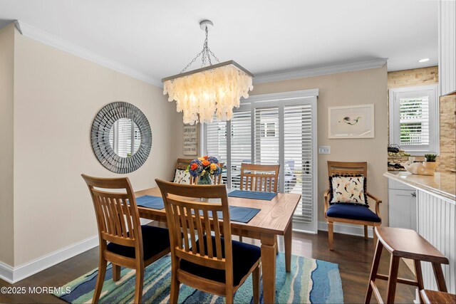 3206 Chicopee Pl, Point Pleasant, NJ 08742 - dining room with a chandelier, dark wood-type flooring, crown molding, and baseboards