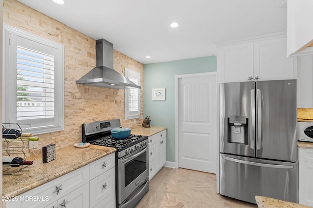 3206 Chicopee Pl, Point Pleasant, NJ 08742 - kitchen featuring stainless steel appliances, wall chimney exhaust hood, backsplash, white cabinets, and healthy amount of natural light
