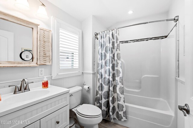 3206 Chicopee Pl, Point Pleasant, NJ 08742 - bathroom with toilet, vanity, shower / bath combo with shower curtain, wainscoting, and recessed lighting