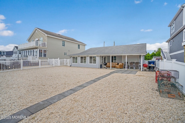 13 Lake Superior Dr, Little Egg Harbor, NJ 08087 - rear view of house with a patio area, a fenced backyard, and an outdoor hangout area