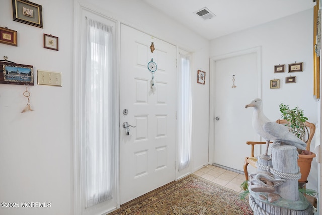 218 Mohican Ln, Little Egg Harbor, NJ 08087 - entryway featuring light tile patterned floors