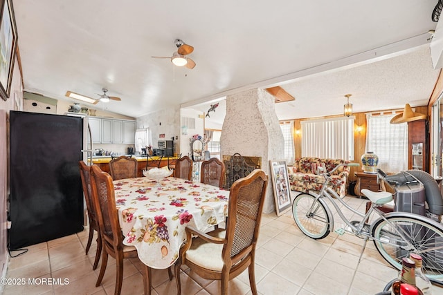 927 Beach Haven W Blvd, Manahawkin, NJ 08050 - dining area with light tile patterned floors, a ceiling fan, and lofted ceiling