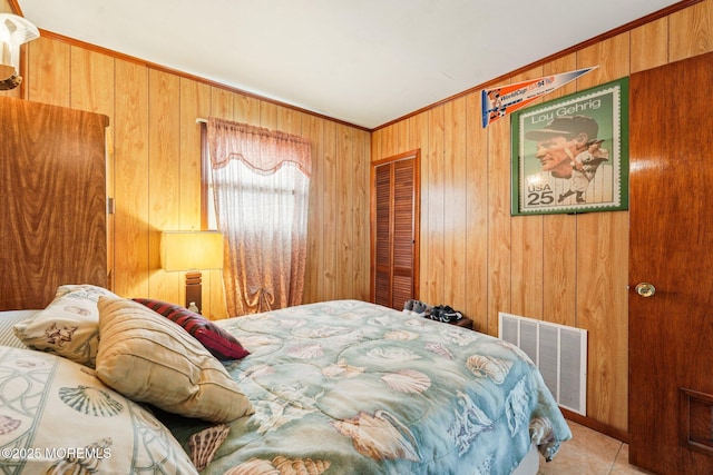 927 Beach Haven W Blvd, Manahawkin, NJ 08050 - bedroom featuring wooden walls, a closet, and crown molding