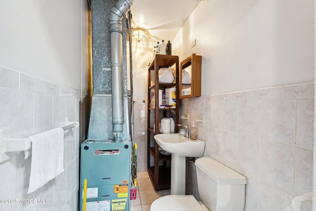927 Beach Haven W Blvd, Manahawkin, NJ 08050 - bathroom with tile walls, tile patterned flooring, and a wainscoted wall