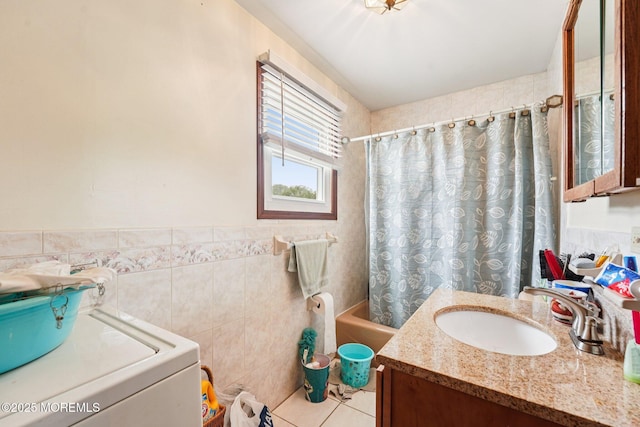 927 Beach Haven W Blvd, Manahawkin, NJ 08050 - bathroom featuring vanity, tile patterned floors, shower / bath combo, tile walls, and washer / clothes dryer