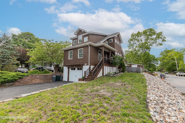 540 Vaughn Ave, Forked River, NJ 08731 - view of side of property featuring stairs, driveway, and an attached garage