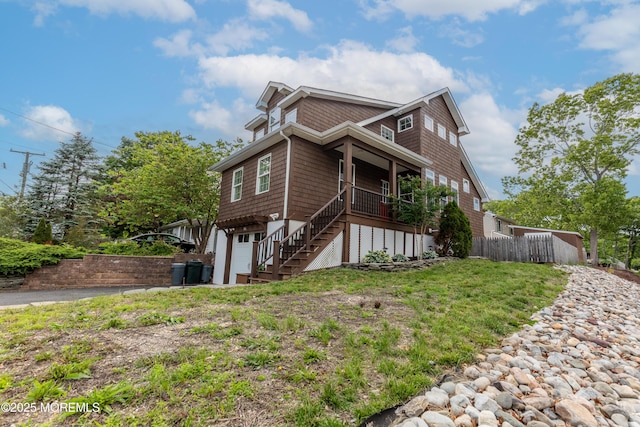 540 Vaughn Ave, Forked River, NJ 08731 - view of side of home with stairs, a porch, and an attached garage